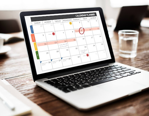 Laptop showing a sample quarterly content planning calendar.